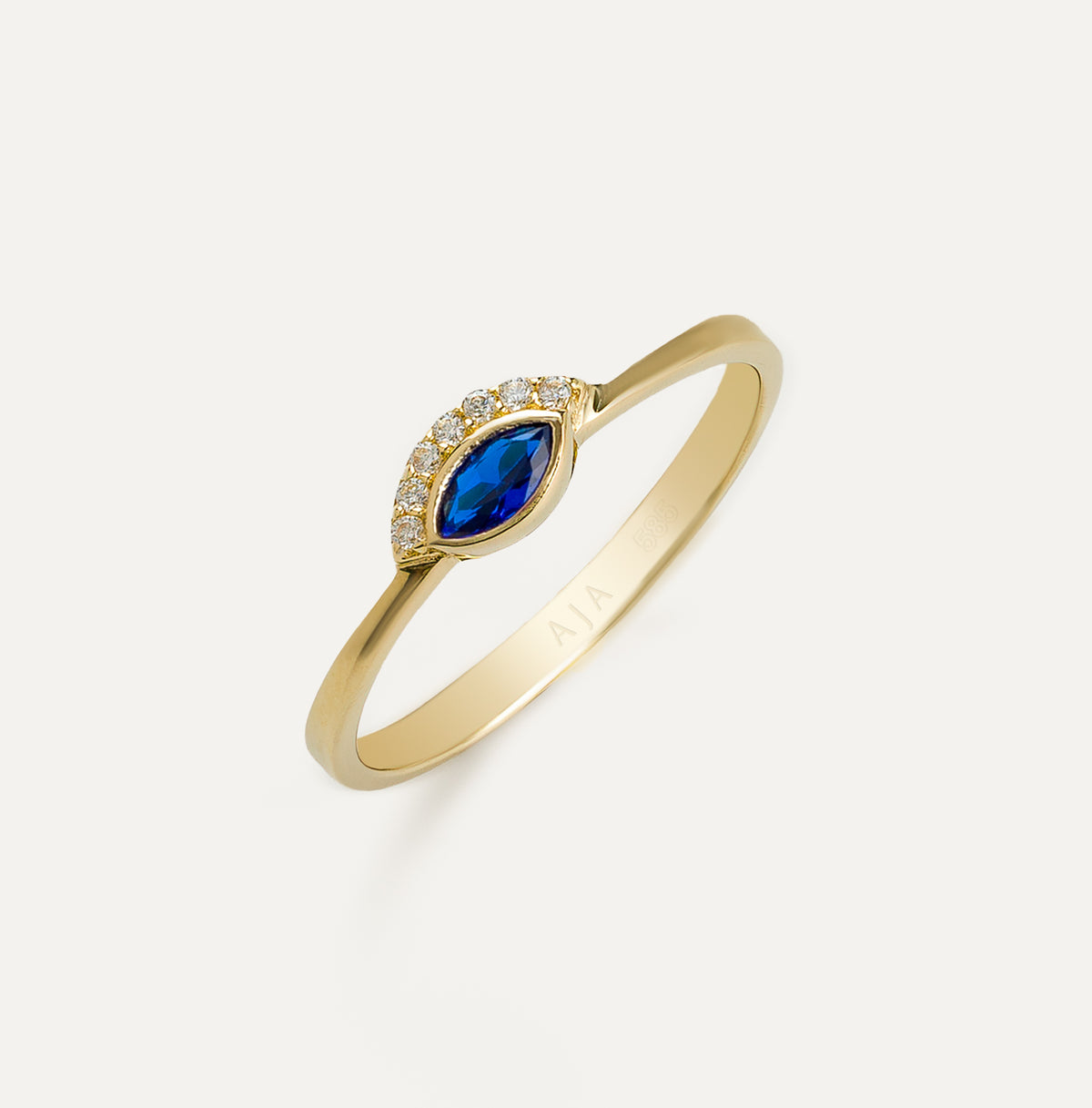 Sapphire Serenity Göz Figürlü Safir Mavisi Renk Markiz Kesim Taşlı Altın Yüzük
