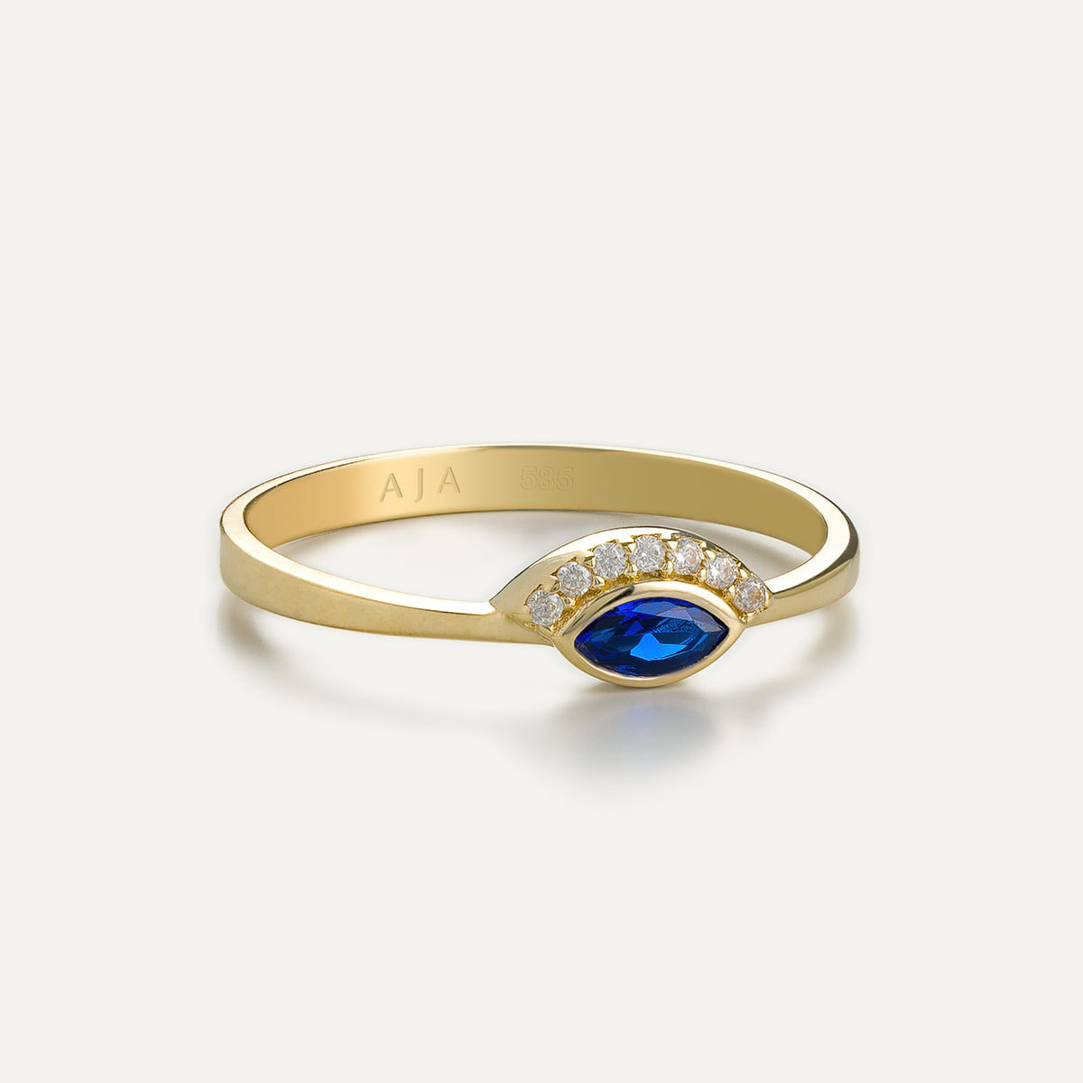 Sapphire Serenity Göz Figürlü Safir Mavisi Renk Markiz Kesim Taşlı Altın Yüzük